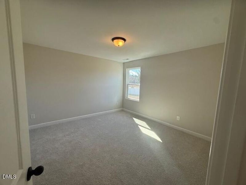 Spacious, unfurnished interior of a new home in Woodland Crossing, Zebulon (Image 13).