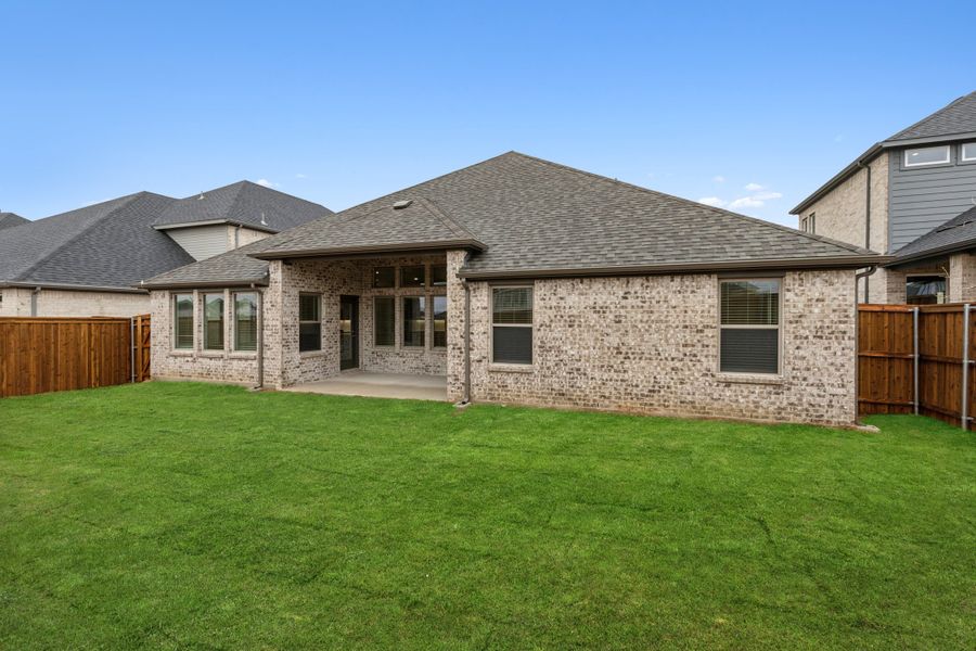 Covered Patio in the Gilmour II home plan by Trophy Signature Homes – REPRESENTATIVE PHOTO