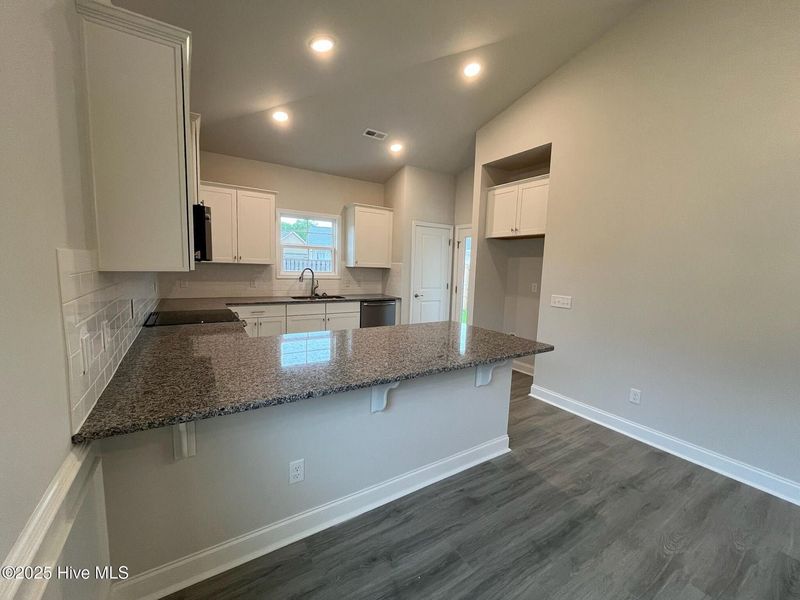 Furnished interior view inside a new home in Palmetto Creek, Bolivia (Image 8).