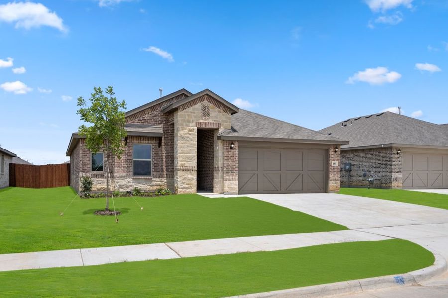 Representative exterior photo of a completed home built from the Lincoln by Impression Homes in Baker Farms, Cleburne, TX (Image 1).