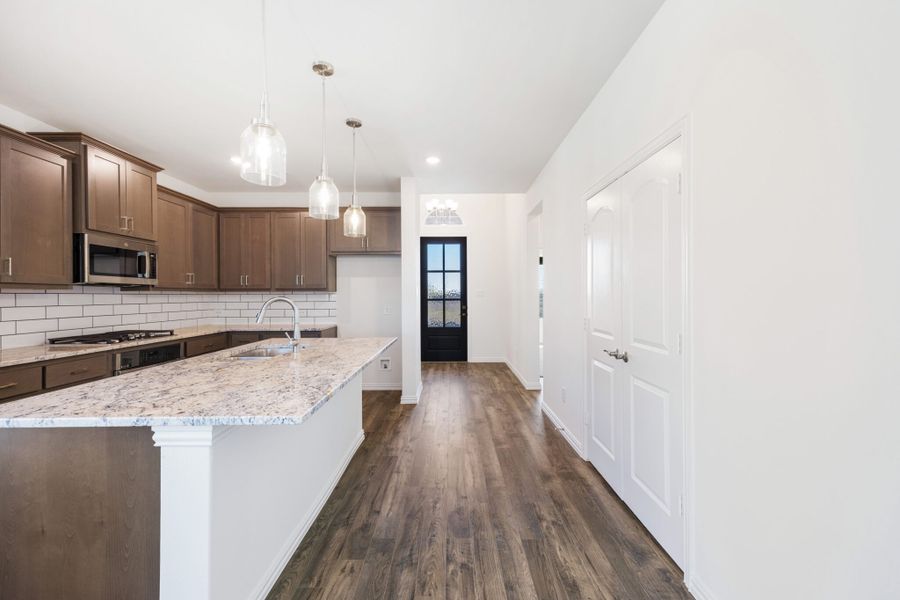 Furnished interior view inside a new home in Edgewater, Fate (Image 9).