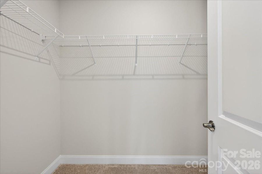 Primary walk-in closet