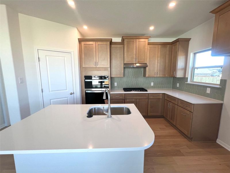 Furnished interior view inside a new home in Crosswinds, Kyle (Image 4).