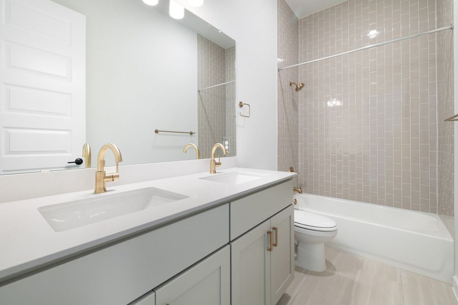 Furnished interior view inside a new home in Wolf Ranch, Georgetown (Image 14).