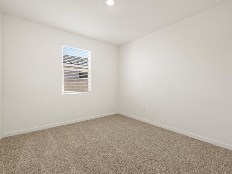 Spacious, unfurnished interior of a new home in Rancho Mirage Signature Series, Maricopa (Image 14).