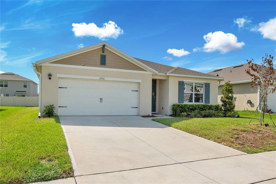 Front exterior of a new home in , Sanford, FL, highlighting curb appeal (Image 22).