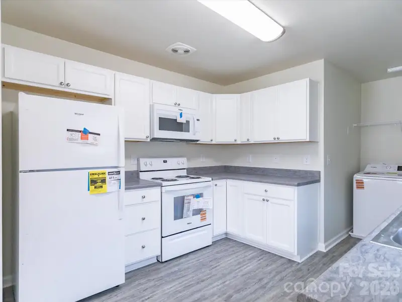 Furnished interior view inside a new home in , Statesville (Image 4).
