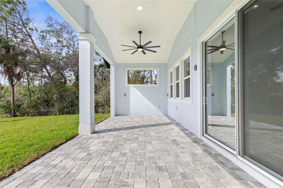 Exterior details and patio area of a home in Palm Coast Plantation, Palm Coast (Image 31).
