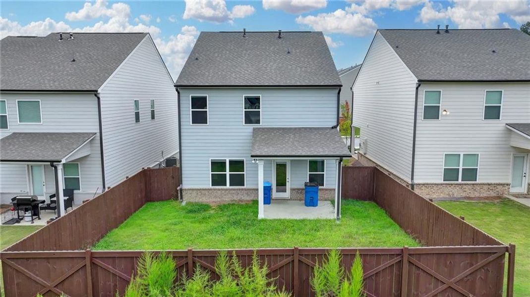 Exterior details and patio area of a home in Westgate Enclave, Loganville (Image 3).