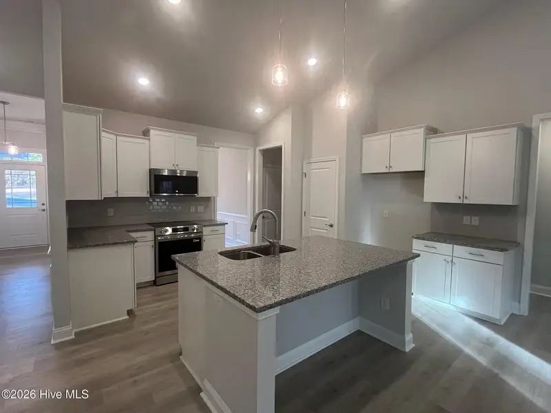 Furnished interior view inside a new home in Palmetto Creek, Bolivia (Image 5).
