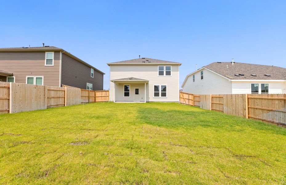 Exterior details and patio area of a home in Patterson Ranch, Georgetown (Image 24).