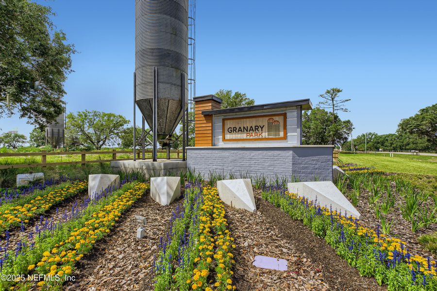 Front exterior of a new home in Granary Park: Granary Park 40s, Green Cove Springs, FL, highlighting curb appeal (Image 7). Front exterior of a new home in Granary Park: Granary Park 40s, Green Cove Springs, FL, highlighting curb appeal (Image 7).