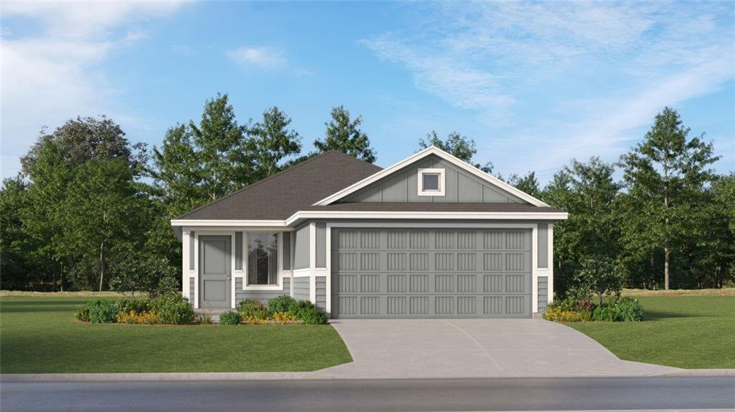 View of front of house featuring a front lawn and a garage