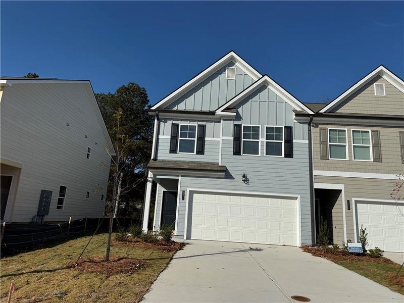 Front exterior of a new home in Rivershire Place, Villa Rica, GA, highlighting curb appeal (Image 1). Front exterior of a new home in Rivershire Place, Villa Rica, GA, highlighting curb appeal (Image 1).