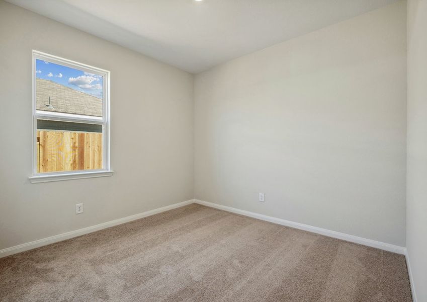 Secondary bedroom with lush carpet flooring Secondary bedroom with lush carpet flooring