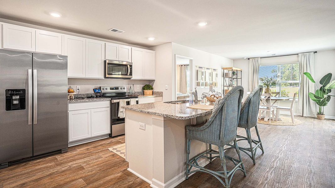 Furnished interior view inside a new home in Stanbury Creek, Supply (Image 6).