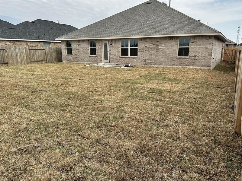Front exterior of a new home in Cobblestone, Texas City, TX, highlighting curb appeal (Image 13). Front exterior of a new home in Cobblestone, Texas City, TX, highlighting curb appeal (Image 13).