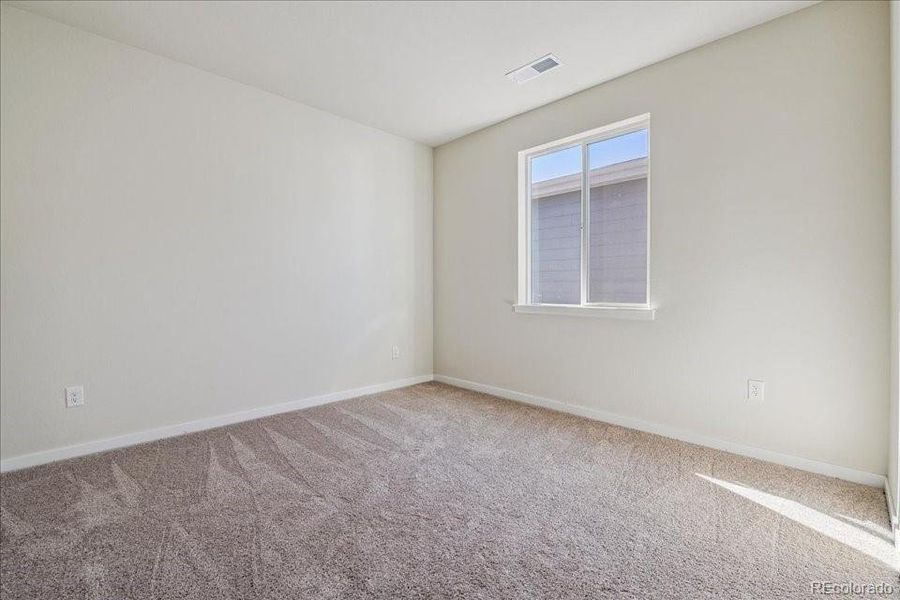 Spacious, unfurnished interior of a new home in Floret Collection at Alder Creek, Parker (Image 15).