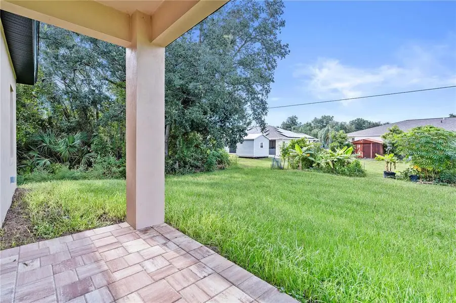 Exterior details and patio area of a home in , Port Charlotte (Image 4). Exterior details and patio area of a home in , Port Charlotte (Image 4).