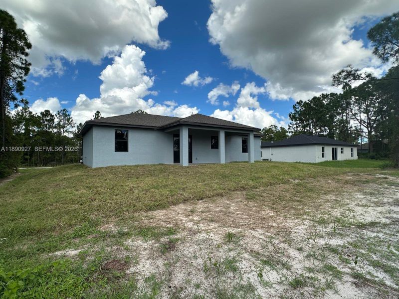 Exterior details and patio area of a home in , Lehigh Acres (Image 8).