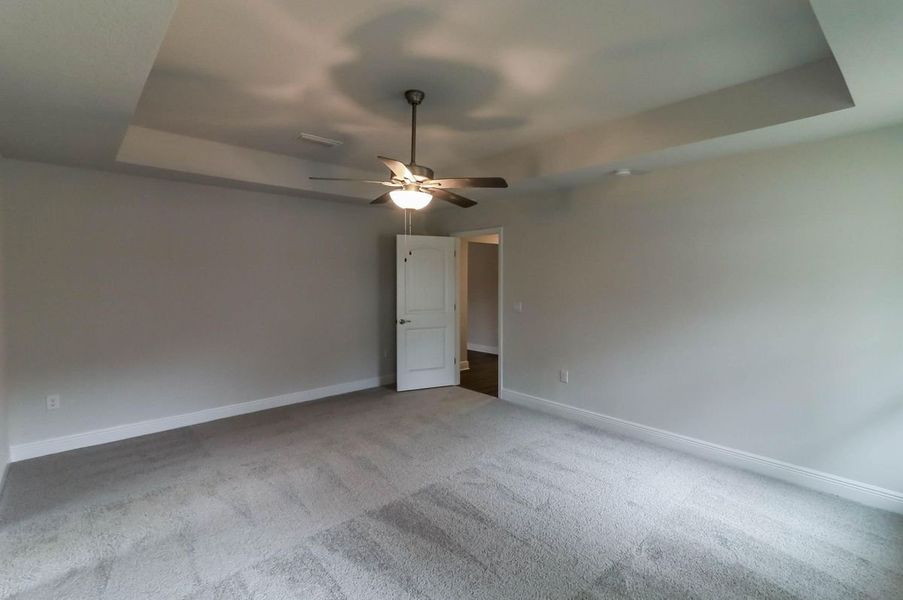 Representative unfurnished interior of a home built from the Plan 3044 by Adams Homes in Cedar Creek at Deerpoint Lake, Panama City (Image 21).