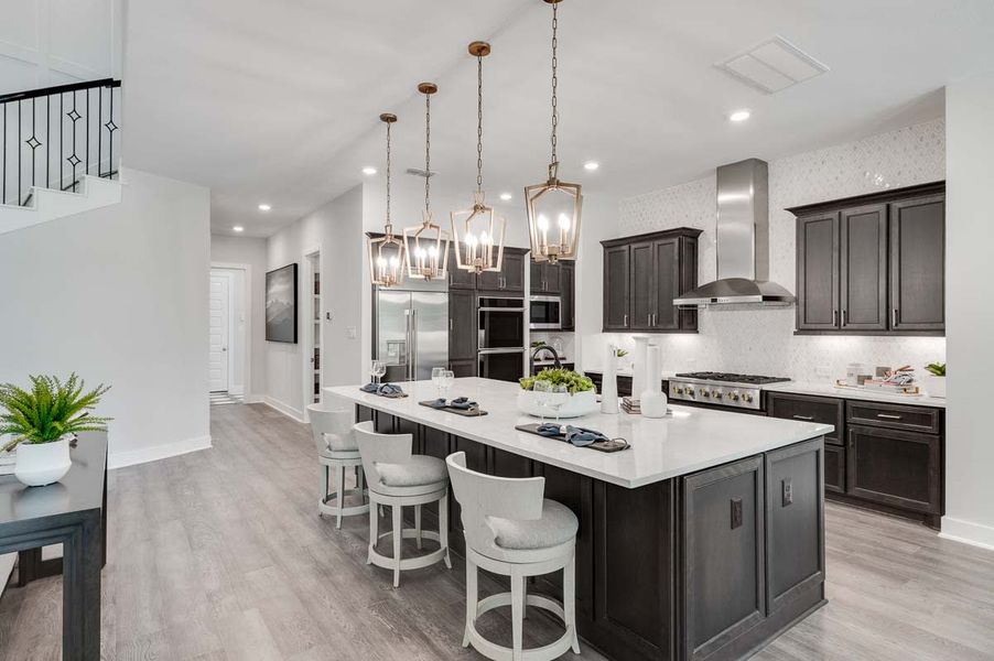 Representative furnished interior of a home built from the Verona by Tri Pointe Homes in Sienna 80′, Missouri City (Image 11).