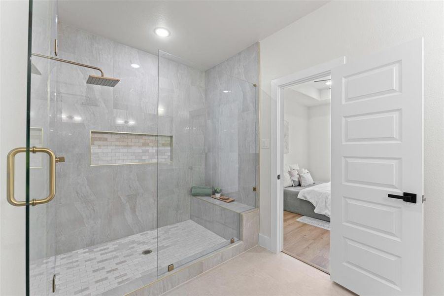Full bath with connected bathroom and a shower stall Full bath with connected bathroom and a shower stall
