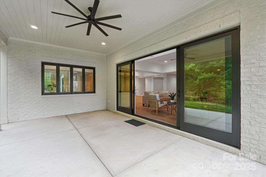 Exterior details and patio area of a home in Cardinal Crest, Weddington (Image 4).