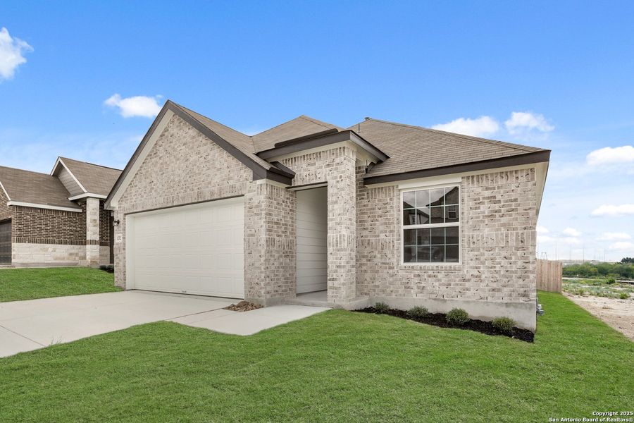 Front exterior of a new home in Hunters Ranch, San Antonio, TX, highlighting curb appeal (Image 2).