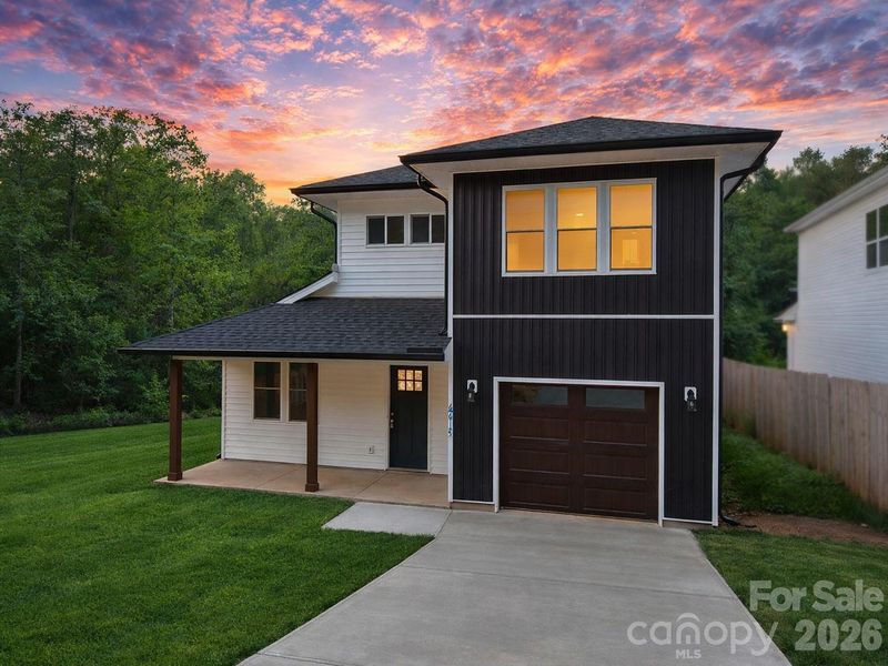 Front exterior of a new home in , Charlotte, NC, highlighting curb appeal (Image 1). Front exterior of a new home in , Charlotte, NC, highlighting curb appeal (Image 1).