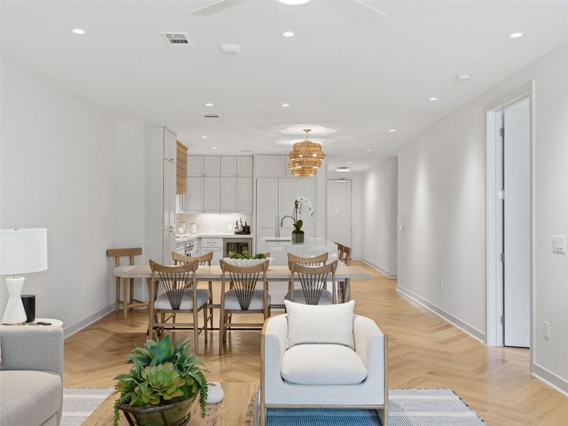 Spacious living/dining/kitchen has high ceilings Spacious living/dining/kitchen has high ceilings