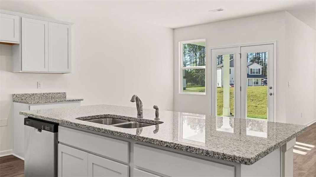 Furnished interior view inside a new home in Oakchase at Hampton, Hampton (Image 12).