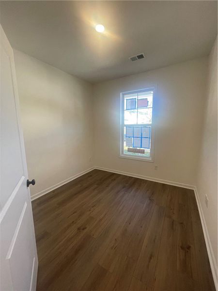 Spacious, unfurnished interior of a new home in Springwood Grove, Central (Image 10).