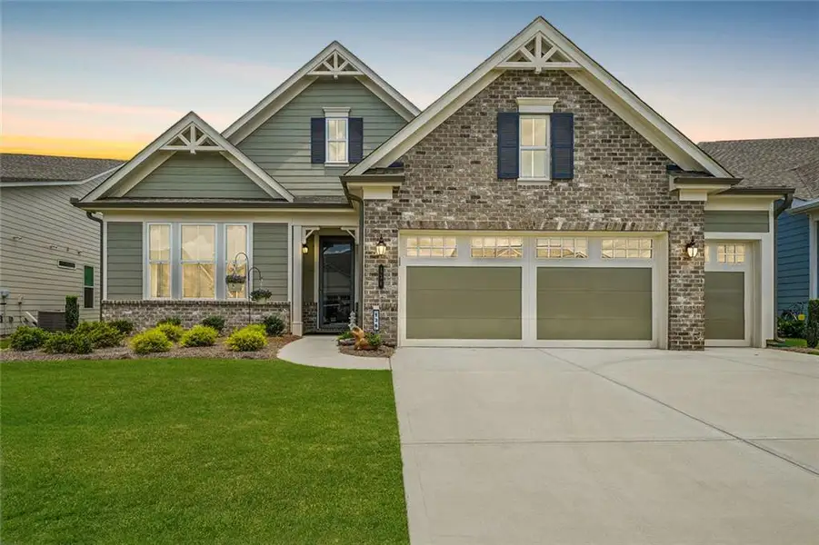 Front exterior of a new home in , Hoschton, GA, highlighting curb appeal (Image 24). Front exterior of a new home in , Hoschton, GA, highlighting curb appeal (Image 24).