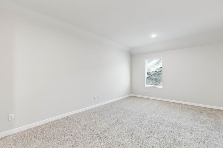 Bedroom in the Haylee home plan by Trophy Signature Homes - REPRESENTATIVE PHOTO