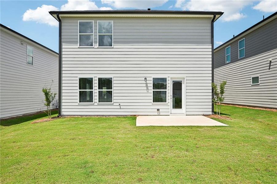 Front exterior of a new home in Hawthorne Station, College Park, GA, highlighting curb appeal (Image 2). Front exterior of a new home in Hawthorne Station, College Park, GA, highlighting curb appeal (Image 2).