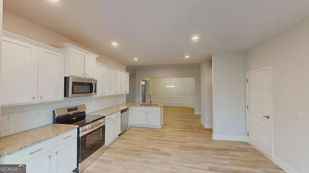 Furnished interior view inside a new home in Holliday Pass, Griffin (Image 4).