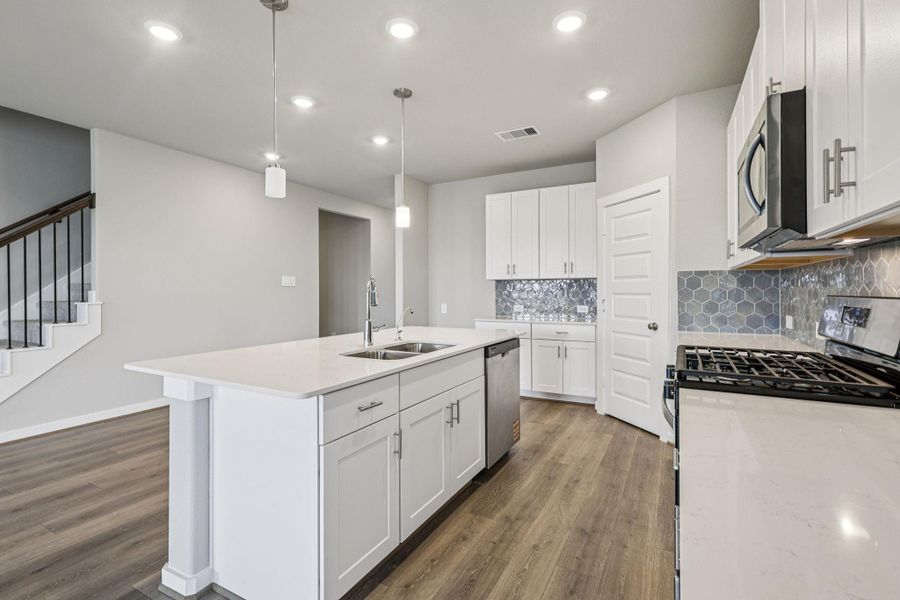 Photo is not of the actual home, but is an inspirational photo of builder’s model home and may depict options, furnishings, and/or decorator features that are not included