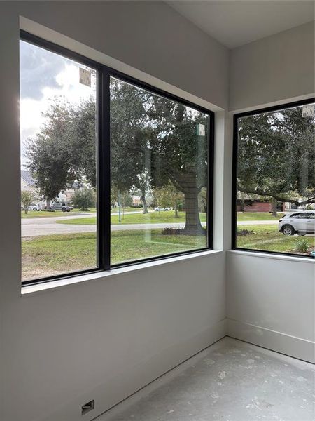 Beautiful view from Dining Room first floor.  Wood floors. Connected to a Butlers Pantry with drain and plug ready for ice maker or additional fridge. Bar area also.