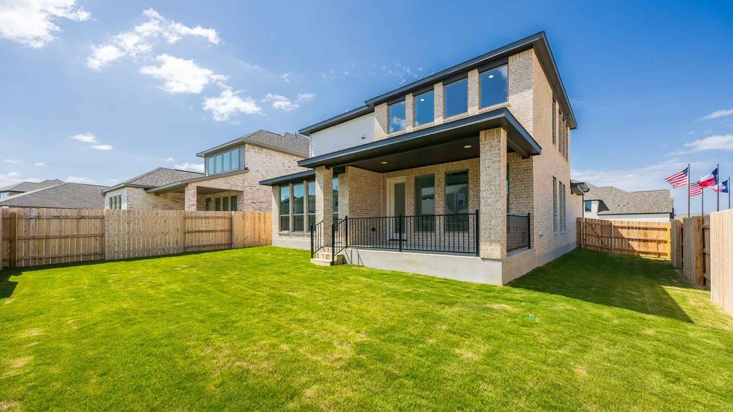Exterior details and patio area of a home in Lariat 45', Liberty Hill (Image 3).