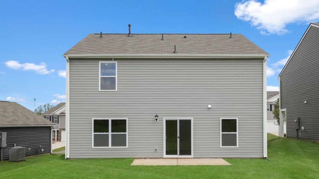 Exterior details and patio area of a home in Treemont Commons, Wellford (Image 22).