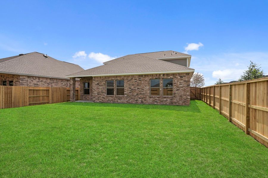 Exterior details and patio area of a home in Windrose Green, Angleton (Image 4). Exterior details and patio area of a home in Windrose Green, Angleton (Image 4).