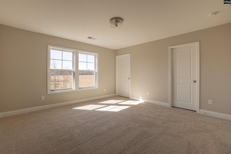 Spacious, unfurnished interior of a new home in The Cove, Sumter (Image 54).