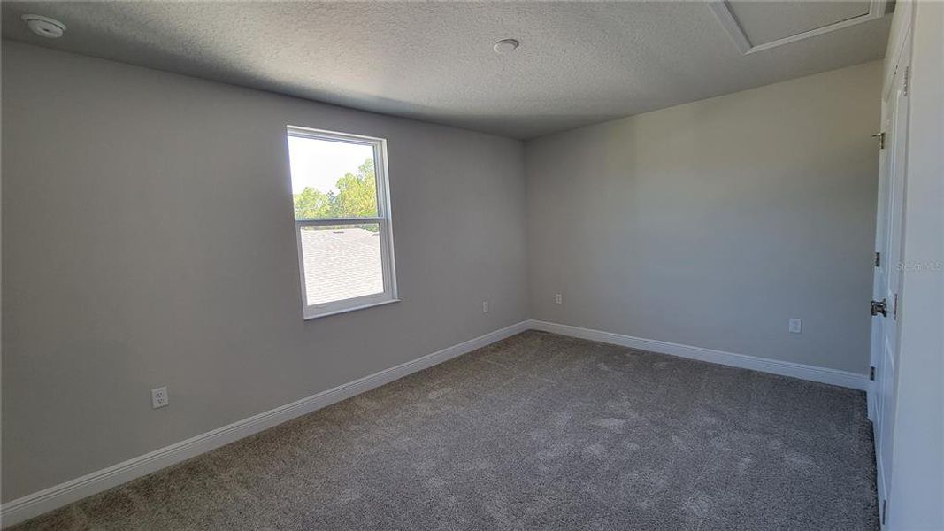 Spacious, unfurnished interior of a new home in , New Smyrna Beach (Image 9).