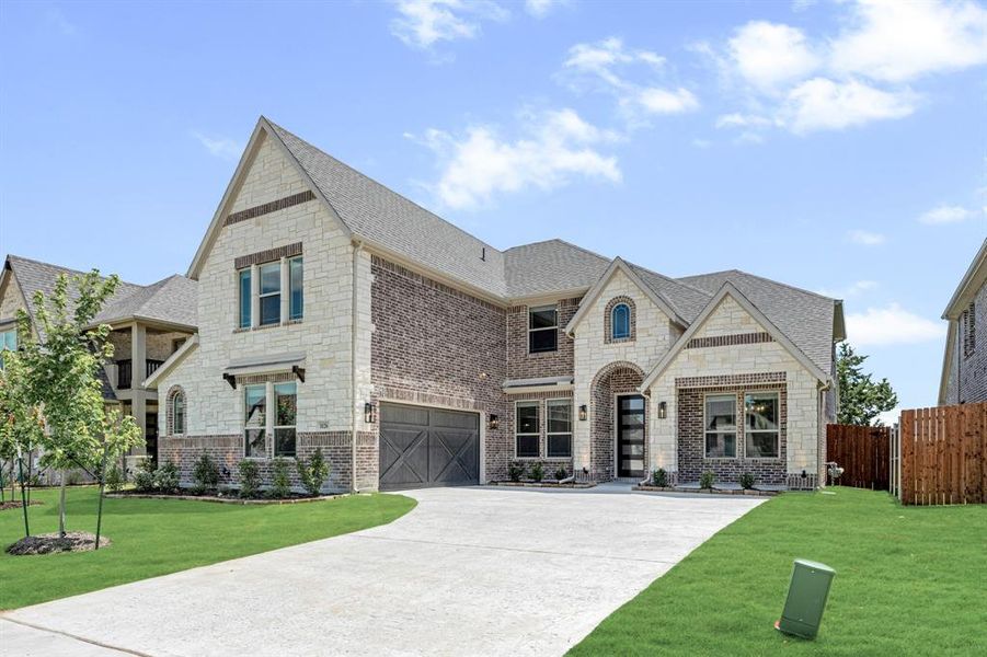 Front exterior of a new home in Mockingbird Heights Classic 60, Midlothian, TX, highlighting curb appeal (Image 26). Front exterior of a new home in Mockingbird Heights Classic 60, Midlothian, TX, highlighting curb appeal (Image 26).