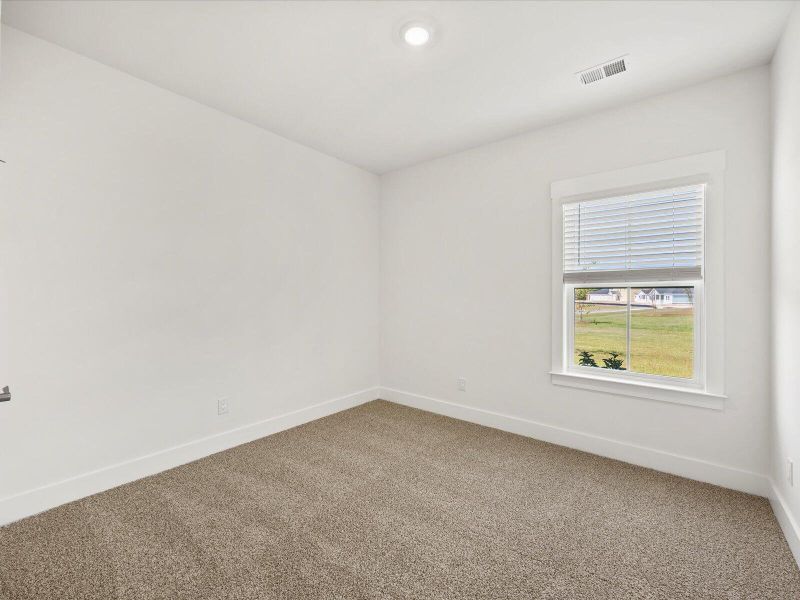 Spacious, unfurnished interior of a new home in The Coves at Lakes of Cane Bay, Summerville (Image 19). Spacious, unfurnished interior of a new home in The Coves at Lakes of Cane Bay, Summerville (Image 19).
