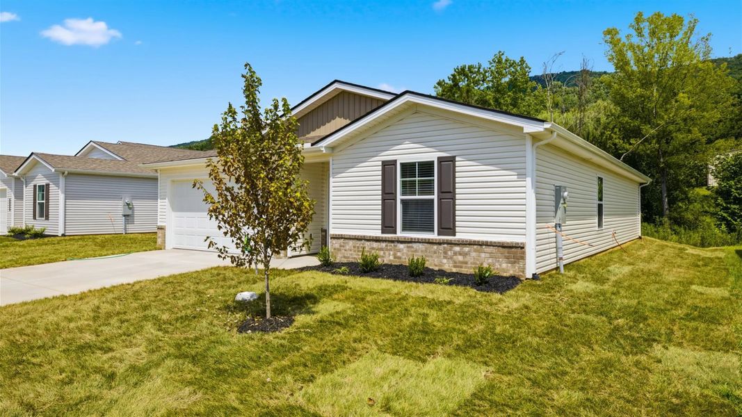 Front exterior of a new home in Emory Creek, Harriman, TN, highlighting curb appeal (Image 19).