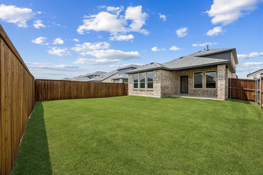 Front exterior of a new home in AnaCapri, Anna, TX, highlighting curb appeal (Image 22). Front exterior of a new home in AnaCapri, Anna, TX, highlighting curb appeal (Image 22).