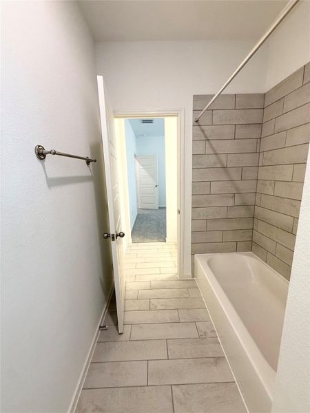 Furnished interior view inside a new home in , Iowa Colony (Image 6).