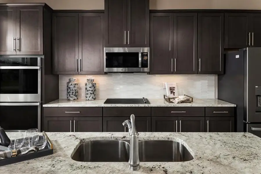 Representative furnished interior of a home built from the Rochelle by Ryan Homes in Bellaviva, Auburndale (Image 3).